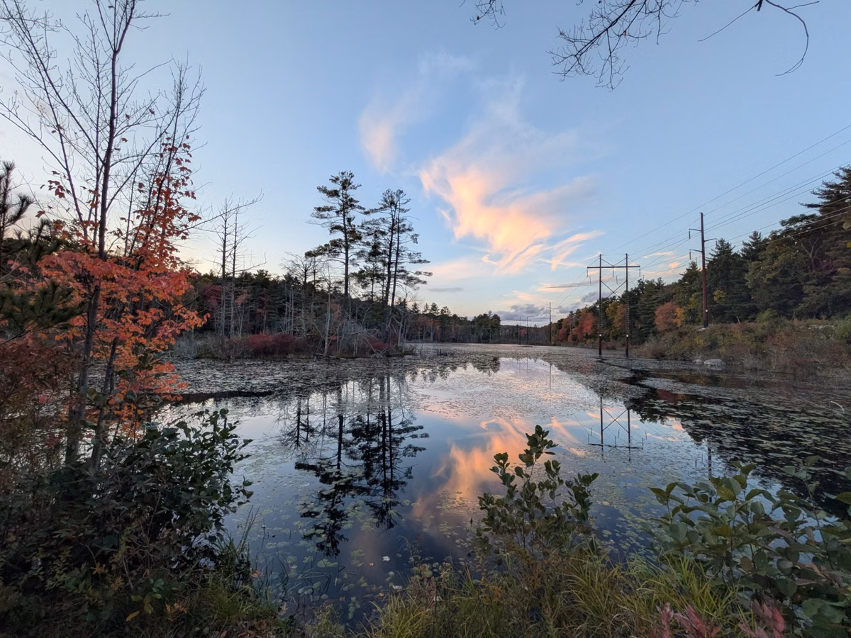 A New Hampshire pond under a fall evening sky (Wooding Pond, Goffstown, not in the park)